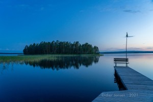 Late night lake with Swedish flag